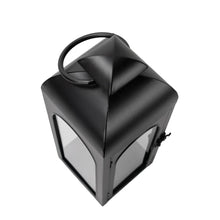 Black metal lantern candle holder corner view with carry handle and arched glass panels