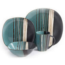 Teal striped dinnerware set featuring plates, bowls, and a mug