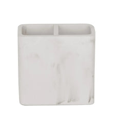 White faux marble toothbrush holder with two-part top opening, front view
