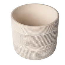 Round white ceramic planter with ribbed banding pattern