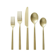 Gold stainless steel flatware set with ridged handles: forks, knives, and spoons