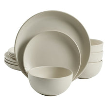 Cream matte dinnerware set with nested bowls and cups