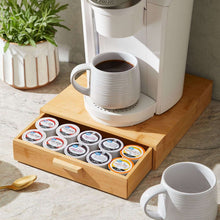 Natural bamboo k-cup organizer with open drawer holding assorted coffee pods