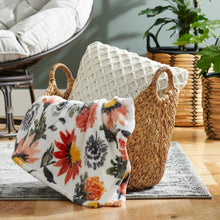 Natural water hyacinth boat basket with handles and floral fabric liner