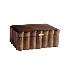 Scalloped wooden jewelry box with hinged lid and brass latch, natural brown.