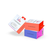Billie razor refill boxes and an insert card in red, blue, and white