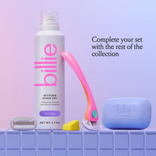 Razor starter kit with pink handle, shave gel bottle, and magnetic holder