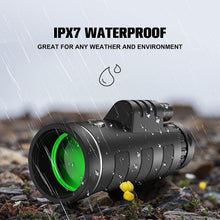 Black monocular with green front lens, water droplets, weatherproof design