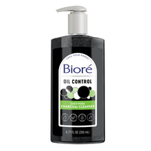 Daily face wash bottle with pump, dark charcoal cleanser and Biore Oil Control label.