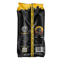 Ground coffee bag, black with gold top; Black Rifle Coffee Company label and barcode.