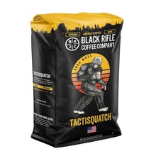 Ground coffee bag, black with gold top; America’s Coffee logo and Tactisquatch text.