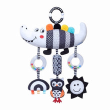 Baby hanging sensory rattle with striped crocodile plush and three dangling character charms