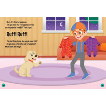 Hardcover storybook open page with Blippi and a dog in colorful pajamas