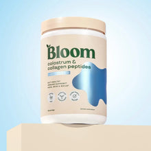 Bloom colostrum & collagen peptides supplement tub on pedestal, front view
