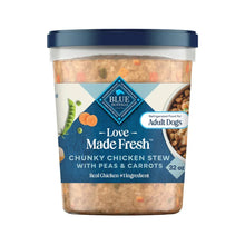 Front of refrigerated dog food tub with blue lid; chunky chicken stew