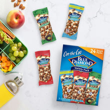 Blue Diamond almond variety pack box with three snack pouches on a table