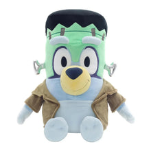 Jumbo character plush with green head, light-blue body, tan jacket, and white-blue paws