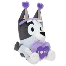 Jumbo plush dog with purple heart and “I love you” patch, side pose, front paws visible