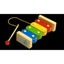 Colorful wooden xylophone with mallet on a cord and stacked rainbow keys