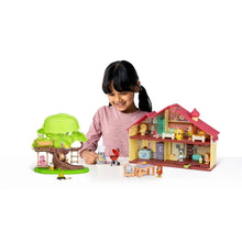 Bluey mega playset house and green tree accessories with child holding