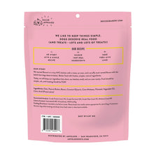 Pink dog biscuit treat bag back with feeding directions and ingredient info