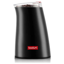 Electric coffee grinder in black with transparent hopper and beans inside