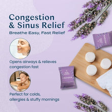 Lavender shower steamer tablets and purple sachets with loose steamer rounds