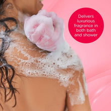 Foamy body wash bubbles on skin, heart-shaped foam detail