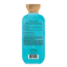 Turquoise body wash bottle back label with ingredient text and barcode