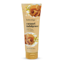 Bodycology caramel indulgence body cream squeeze tube, golden beige with caramel swirl graphic