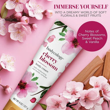 Cherry blossom body cream tube with cherry blossom flowers and gold cap