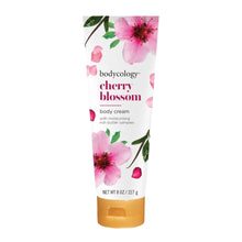 Cherry blossom body cream tube with pink floral design and gold cap