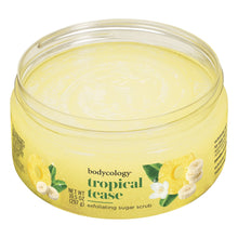 Bodycology Tropical Tease exfoliating sugar scrub tub, clear-view jar front on light yellow base.