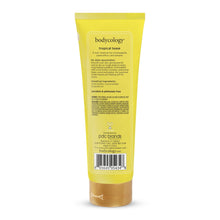 Back view of a yellow body cream tube with label text