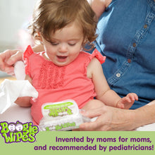 Boogie Wipes gentle saline nose wipes being used on a baby with a wipe.