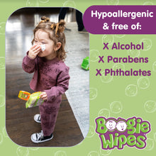 Boogie Wipes saline nose wipes being used on a toddler’s nose