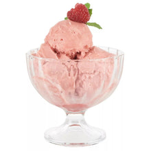 Glass dessert bowl with pink ice cream and raspberry garnish