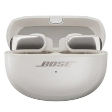 Bose charging case with two open-ear earbuds, silver interior tips