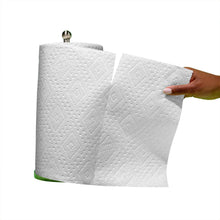 Bounty Advanced paper towel rolls held in hand, white rolls with top core
