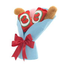 Blue plush bouquet with two red dinosaur nugget faces, tan arms, and red bow