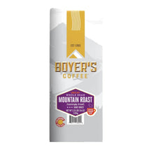 Whole bean coffee bag on white background with Mountain Roast Decaf Dark Roast label