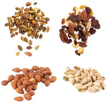 Assorted roasted nuts and dried fruit pieces in four separate piles