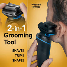Electric grooming tool with precision trimmer head shown near sideburn area