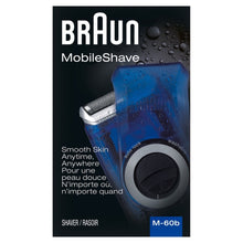 Blue electric shaver with metal foil head and circular control dial, battery powered.