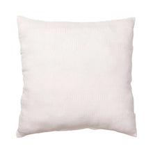 Decorative indoor/outdoor pillow with solid white textured cover
