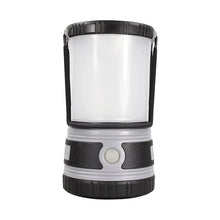 Black and gray LED lantern with circular power button on front panel