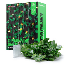 LED cascading curtain vine lights with green leaf strands and warm white bulbs