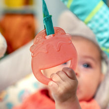 Translucent honey pot teether toy with blue-green handle on baby bouncer
