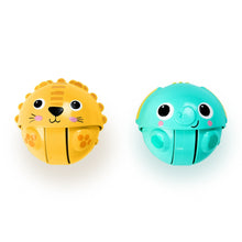 Rolling animal toy balls: yellow lion and teal elephant with hinged faces