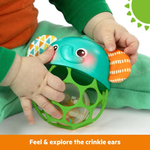 Teal elephant light-up rattle with green ring and orange patterned side ear